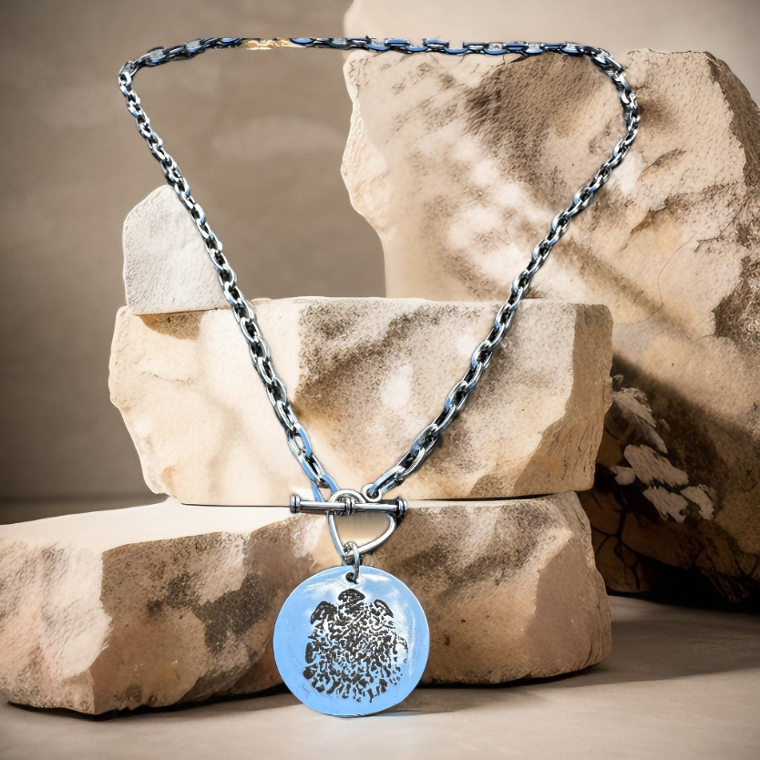 Double sided kiss and foot print on heart toggle clasp