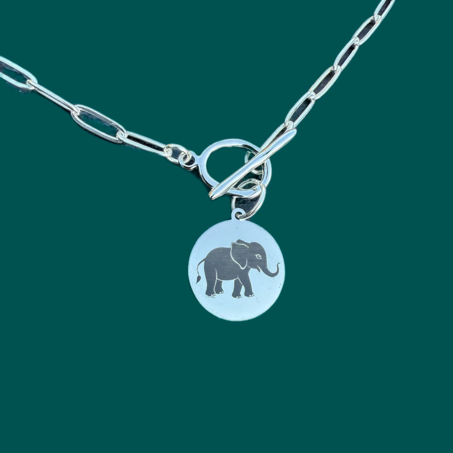 Double sided silver pendant